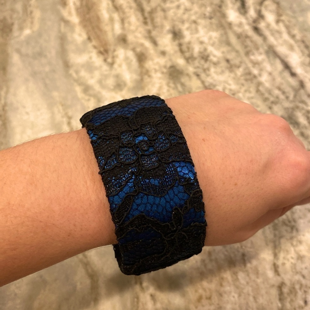Blue cuff bracelet with black lace overlay